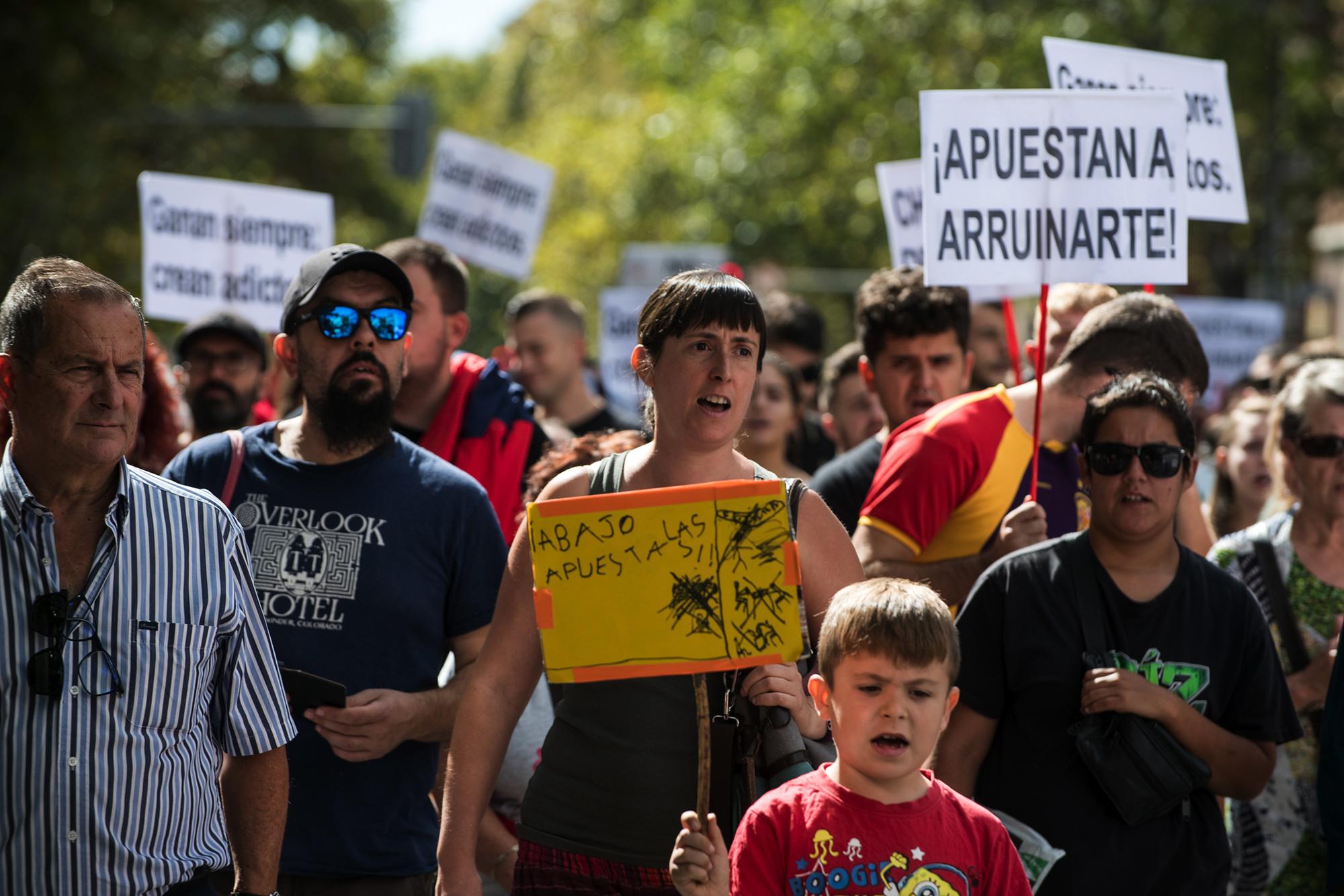 Manifestacion contra las casa de apuestas en el barrio de Tetuan, Madrid.